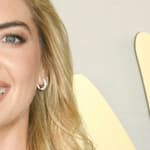 Kate Upton smiles at an event