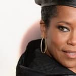 Regina King poses