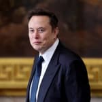 Elon Musk in a suit