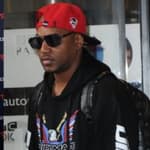 Side by side of Chad Johnson and Cam'ron Giles.