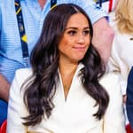 Meghan Markle smirking