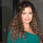 Denise Richards rocks a green one shouldered dress as she exits studios in NYC