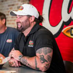 Singer/Songwriter Koe Wetzel and Raising Cane’s CEO Todd Graves at Raising Cane’s corporate office