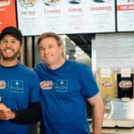 Luke Bryan and Todd Graves at Raising Cane's