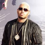 Chris Brown posing on the red carpet.