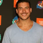 Jax Taylor posing on the red carpet.