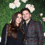 Tom Schwartz and Katie Maloney posing together on the red carpet.