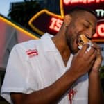 Man eating Arby's sandwich