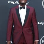 Zion Williamson posing on the red carpet.