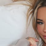 Emily Elizabeth snaps a selfie in bed.