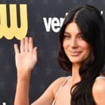 Camila Morrone waving