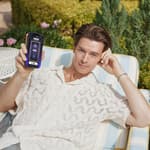 Patrick S. posing with a phone.