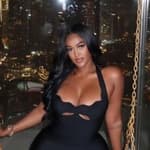 Antoniqua Brown in a black dress