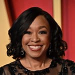 Shonda Rhimes posing on the red carpet.