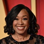 Shonda Rhimes posing on the red carpet.