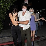 Kaia Gerber and Jacob Elordi are camera shy as the couple go club hopping