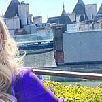 Rebel Wilson in a purple dress