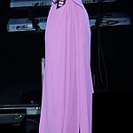 Shakira wearing a purple gown