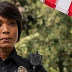 A photo of Angela Bassett in a police uniform
