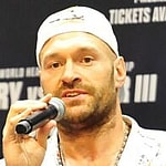 Boxer Deontay Wilder a nd Tyson Fury tensely at a press conference in downtown Los Angeles