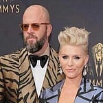 A lovely photo showing Chris Sullivan and Rachel Sullivan in suits at the Emmy awards.