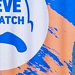 A photo showing Steve Harvey in a denim outfit.