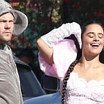 James Corden seems taking a smoke off random strangers joint between takes as he joins Camila Cabello Billy Porter and Idina Menzel in street performance for new movie