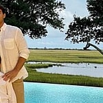 A photo showing Madison LeCroy, her fiancé, Brett, and her son taking a family portrait beside the pool