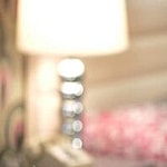 A photo showing Linda Blair in a brown suit and purple inner T-shirt.