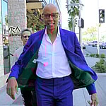 RuPaul Seen Leaving Lunch In Fashionably Blue Suit & Brown Designer Handbag