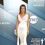 A photo of Jennifer Aniston in a white dress at the 26th Annual SAG Awards - Arrivals