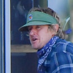 Owen Wilson stops by Erewhon Market and enjoys a bite outside with blonde woman