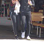 Shawn Mendes with arm around Camila Cabello