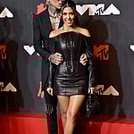 Kourtney Kardashian & Travis Barker posing