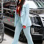 Cardi B looks looks radiant in a light blue suit as arriving at an office building in NYC