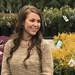 Jana Duggar in a garden