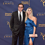 Bob Saget and Kelly Rizzo smiling.