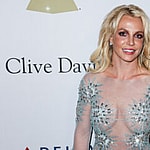 Singer Britney Spears wearing a custom Uel Camilo dress, Loriblu shoes and bag, and a Jen Hansen ring arrives at The Recording Academy And Clive Davis' 2017 Pre-GRAMMY Gala held at The Beverly Hilton Hotel on February 11, 2017 in Beverly Hills, Los Angeles, California, United States.