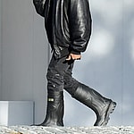 Kanye West is back in his boots as he makes his way around Miami