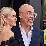 Chelsea Handler and Jo Koy arrive for the 64th annual Grammy Awards at the MGM Grand Garden Arena in Las Vegas, Nevada on Sunday, April 3, 2022.