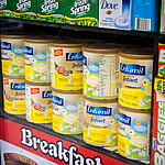 Containers of Enfamil Infant Formula are seen in the window of a grocery store in New York on Sunday, June 16, 2013. The nationwide shortage of baby formula is stressing out parents.