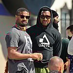 Michael B Jordan is all smiles as he directs quot Creed III quot directing a shirtless Jonathan Majors