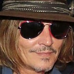 Johnny Depp seen going out of the La Perouse restaurant in Paris
