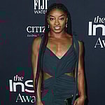 Gymnast Simone Biles wearing an Aliette dress, Christian Louboutin shoes, and Matteo jewelry while carrying a Judith Leiber bag arrives at the 6th Annual InStyle Awards 2021 held at the Getty Center on November 15, 2021 in Los Angeles, California, United States. 15 Nov 2021 Pictured: Simone Biles. Photo credit: Xavier Collin/Image Press Agency / MEGA TheMegaAgency.com +1 888 505 6342 (Mega Agency TagID: MEGA806014_008.jpg) [Photo via Mega Agency]