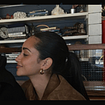 Victoria Fuller and Greg Grippo making eyes at one another.