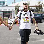 Brian Austin Green all smiles with Sharna Burgess as they head into practice