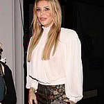 Brandi Glanville wears high heels and fishnet socks as she and a male friend are spotted leaving Craig apos s Eatery together