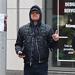 Leonardo DiCaprio helps out a lost tourist with directions in NYC