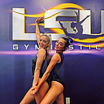 LSU gymnasts Olivia Dunne and Elena Arenas smiling.