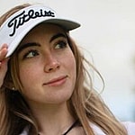 Grace Charis goes golfing in a braless crop top